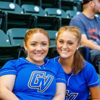 Photo of two young women in the stands at Comerica Park